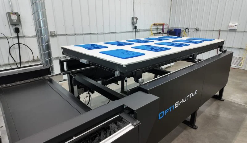 Overhead view of Kern dual table shuttle system for continuous production loading