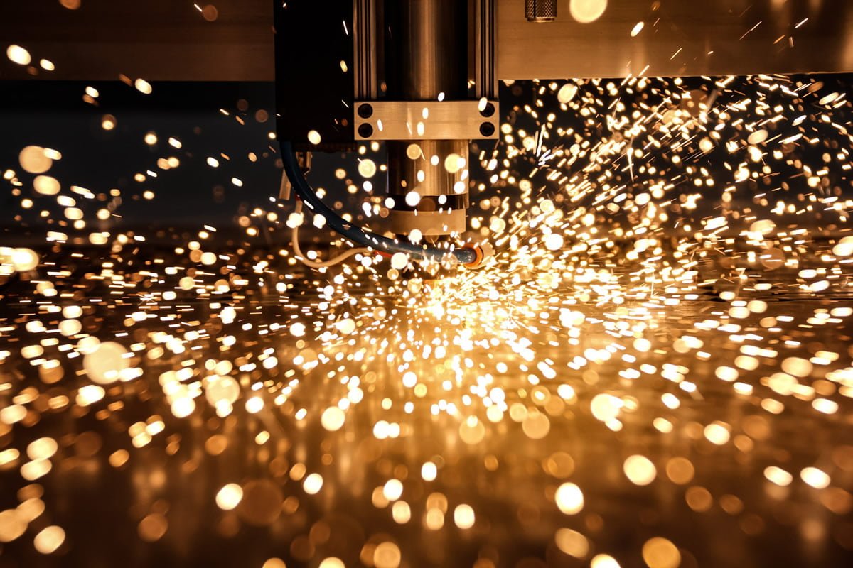 Laser cutting stainless steel sheet metal with nitrogen assist gas