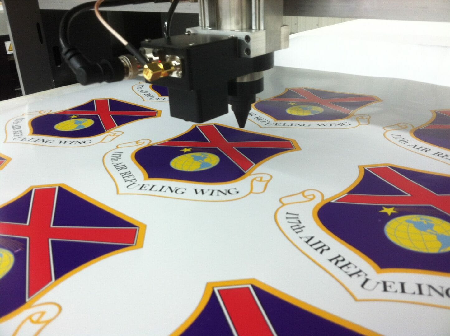 Preprinted acrylic sheet laser cut into custom shapes with flame polished edges