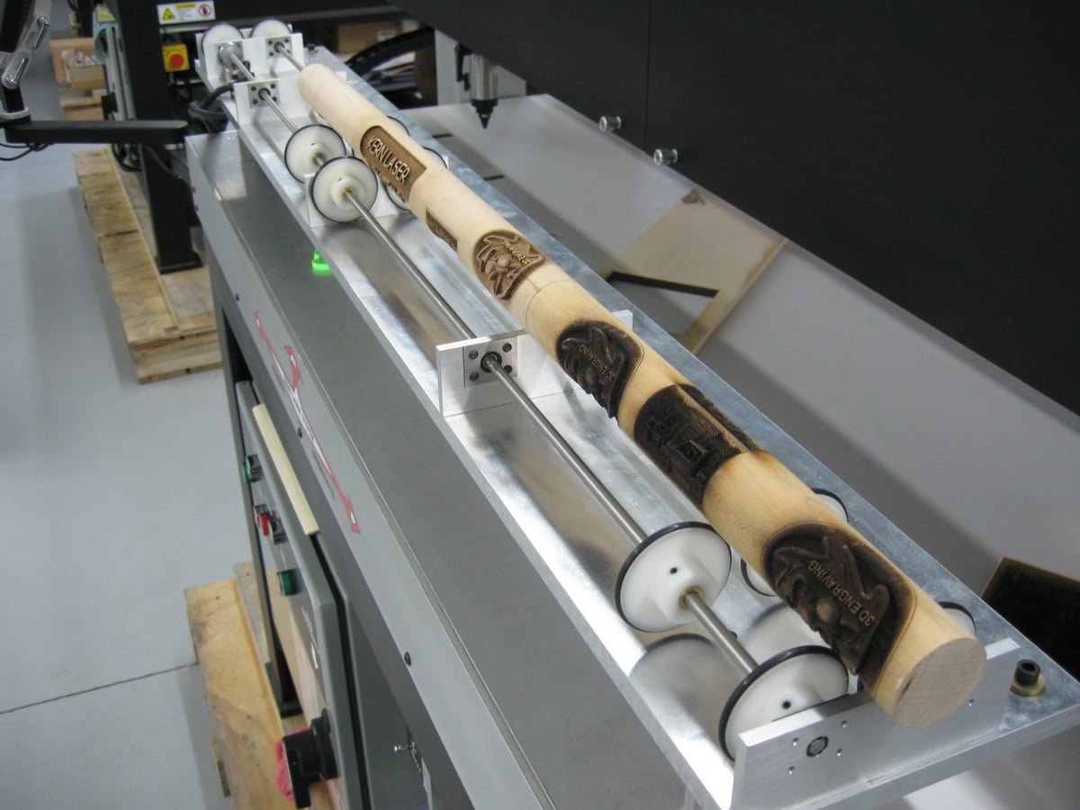 Continuous wheel rotary laser engraving system