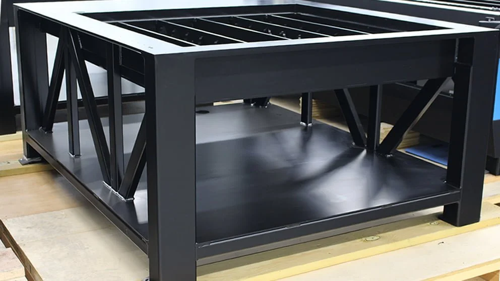 Precision machined solid steel frame for fiber laser